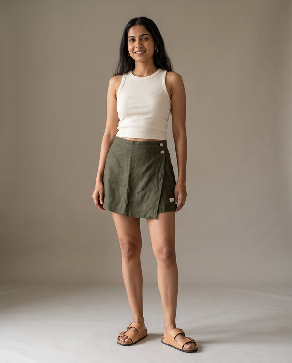 Olive linen skort with pockets, front view on model