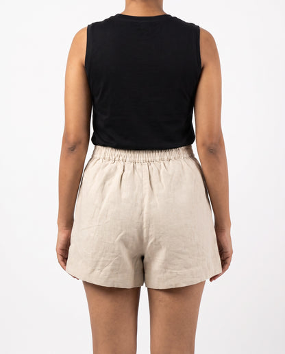 Beige linen skort with pockets, back view with elastic waist