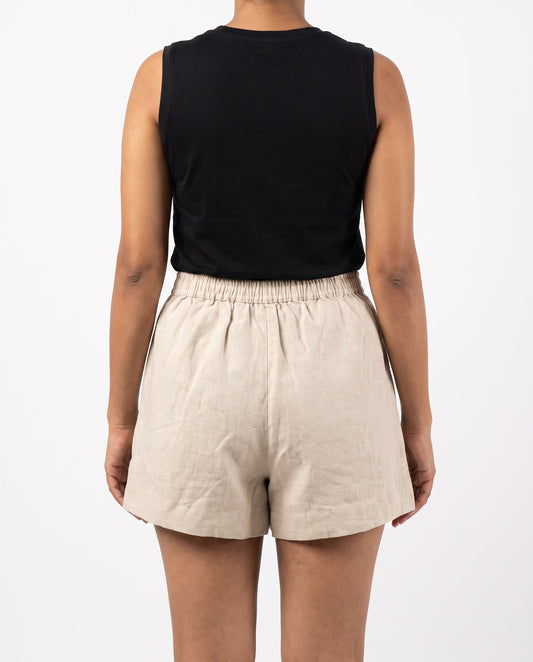 Beige linen skort with pockets, back view with elastic waist