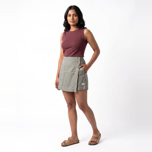 Grey linen skort with pockets, front view on model