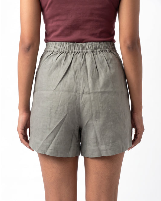 Grey linen skort with pockets, back view with elastic waist