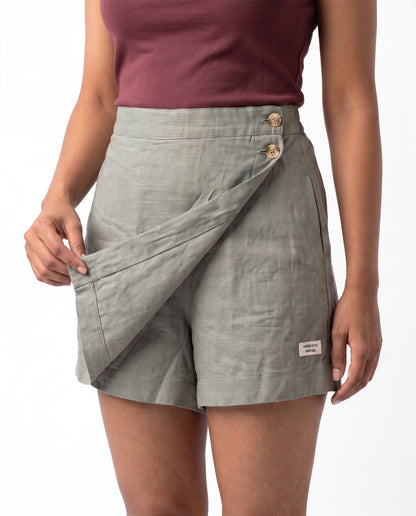 Grey linen skort with pockets, wrap flap lifted to show the shorts underneath