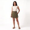 Olive linen skort with pockets, front view on model