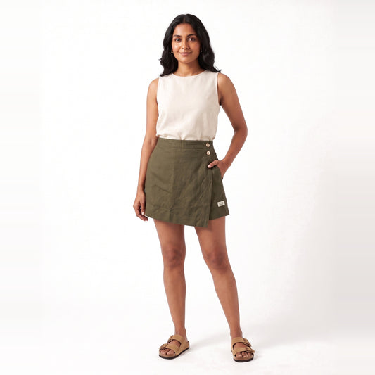 Olive linen skort with pockets, front view on model
