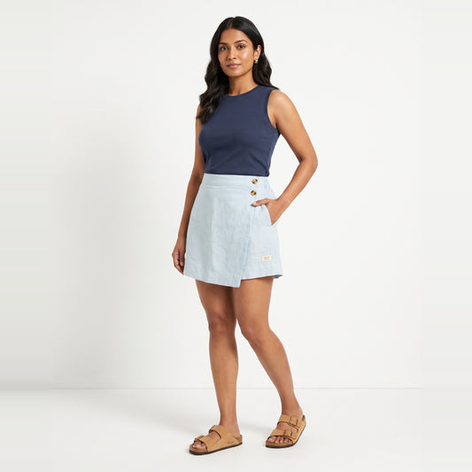 Sky Blue linen skort with pockets, front view on model