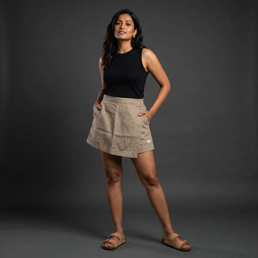 Taupe linen skort with pockets, front view on model