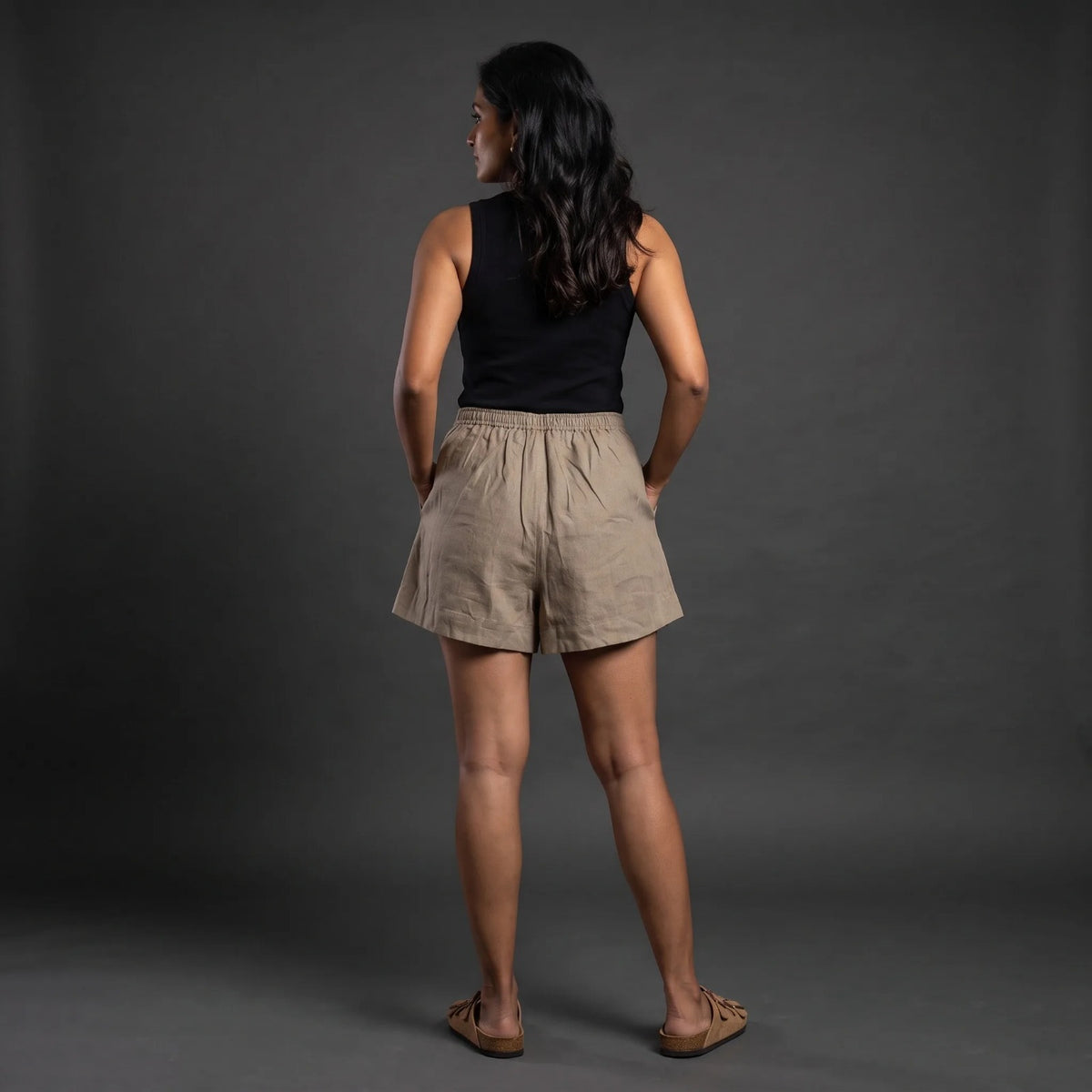 Taupe linen skort with pockets, back view with elastic waist