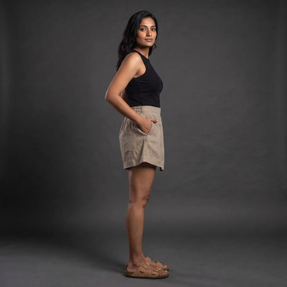 Taupe linen skort with pockets, left side view